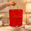 IZELS Premium Glitter Paper Gift Bag 23x18x10 cm for Festive Gifting, Return Gifts & Luxury Packaging -RED