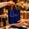 IZELS Premium Glitter Paper Gift Bag 23x18x10 cm for Festive Gifting, Return Gifts & Luxury Packaging -BLUE
