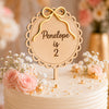 Personalised Wooden Cake Topper with Golden Mirror Acrylic Bow – Custom Name & Age Birthday Cake Decoration